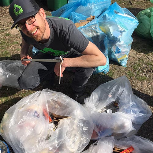 Jeremy Drake sorting items on Earth Day 2018